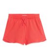 Дитячі трикотажні шорти коралового кольору Arket